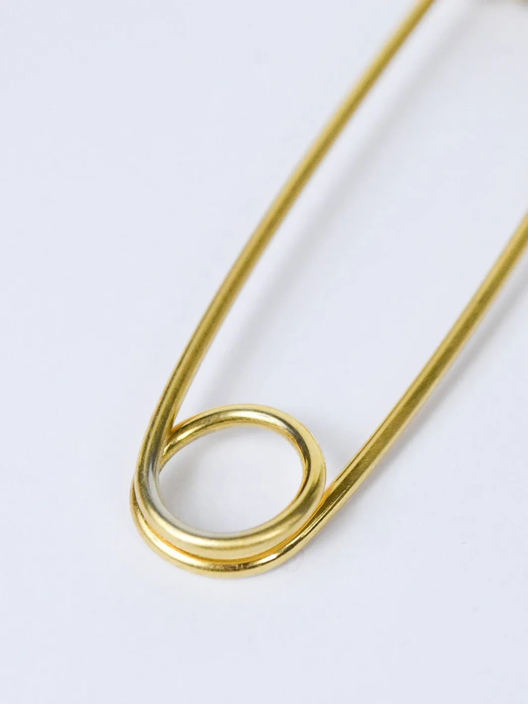 1970s safety pin golden brooch